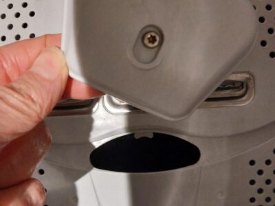 Cherche un bouton fermoir tambour machine à laver